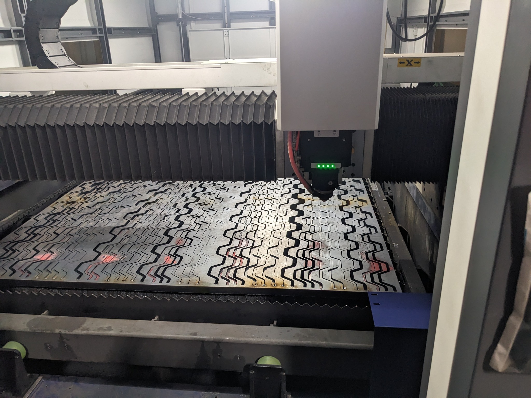 0.315-inch-wide grate strips laser cut from 1-inch-thick carbon steel plate