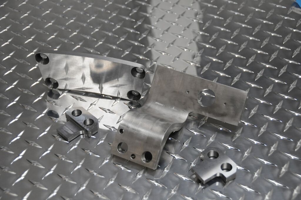 Selection of machined metal components produced at Seaborn Manufacturing